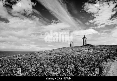 Cap Frehel con il suo faro in Bretagna Foto Stock