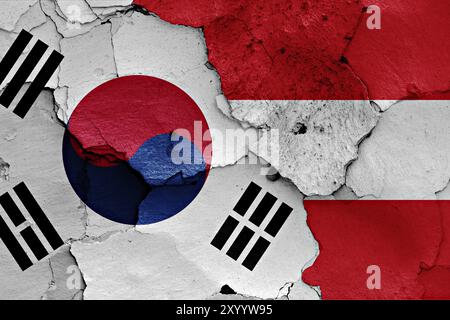 Bandiera della Corea del Sud e dell'Austria dipinta su un muro incrinato Foto Stock