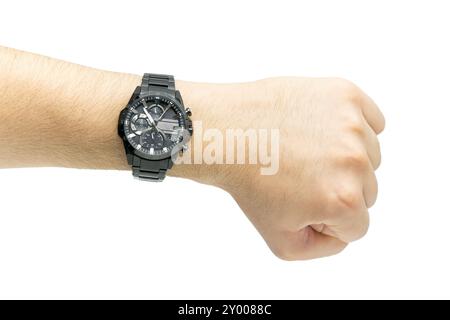 Moderno orologio cronografo nero sul polso di un uomo isolato sul bianco Foto Stock