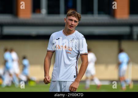 Landore, Swansea, Galles. 31 agosto 2024. Morgan Bates di Swansea City durante il match Under 18 Professional Development League tra Swansea City e Coventry City al JOMA High Performance Centre di Landore, Swansea, Galles, Regno Unito, il 31 agosto 2024. Crediti: Duncan Thomas/Majestic Media/Alamy Live News. Foto Stock