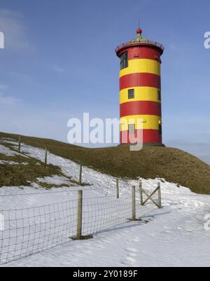 Il faro di Pilsum, un punto di riferimento della Frisia orientale, ora funge da ufficio di registrazione Foto Stock