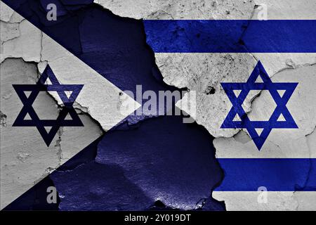 Bandiere della Marina israeliana e di Israele dipinte su un muro incrinato Foto Stock