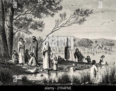 Pellegrini greci che fanno il bagno nel fiume Giordano. Medio Oriente, cerimonie della settimana Santa a Gerusalemme. Le Tour du Monde 1862 Foto Stock