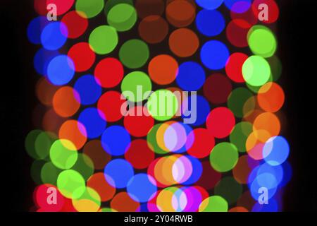 Multicolore bokeh sfocati sullo sfondo delle luci. Abstract sfoca Foto Stock