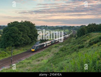 12/06/2024 Bay Horse (a sud di Lancaster) 390046 1R08 0513 da Lancaster a London Euston Foto Stock