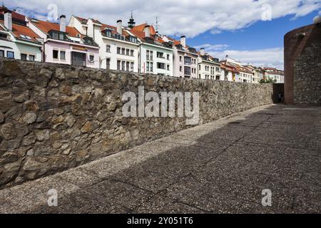 Bratislava city in Slovakia, row of apartment houses behind old city wall fortification Stock Photo