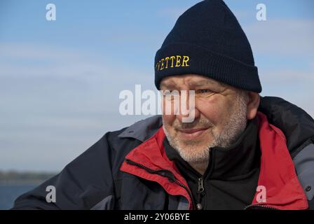 Uomo con cappello da bobble Foto Stock