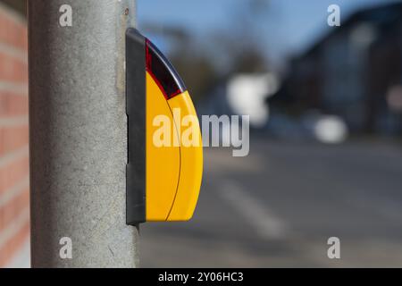 Il pulsante giallo per un semaforo Foto Stock