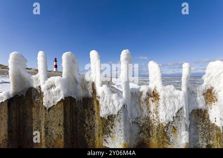 Ghiacciato con faro sullo sfondo, Sylt, Schleswig-Holstein Foto Stock