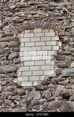 Finestra murata di una rovina Foto Stock