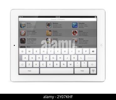 Tastiera virtuale sul display touchscreen del tablet Apple iPad. Isolato con percorso di ritaglio su sfondo bianco Foto Stock