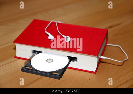 Audiolibro con cuffie Foto Stock