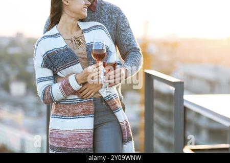 Man and woman with glass of rose wine outdoors Stock Photo