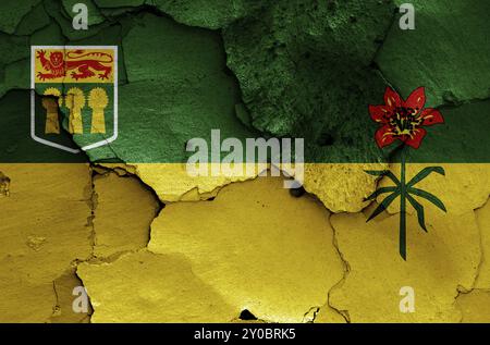 Bandiera di Saskatchewan dipinto su parete fessurata Foto Stock