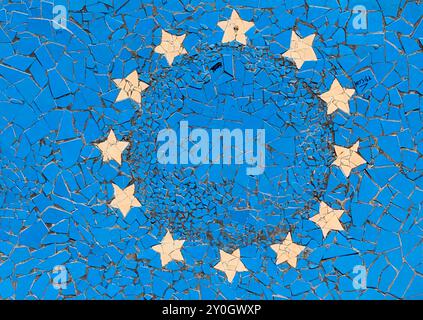 Twelve Golden Stars on a Blue Concrete Wall – Symbol of European Unity Stock Photo