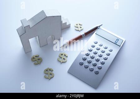 l'immagine commerciale della calcolatrice e della casa Foto Stock