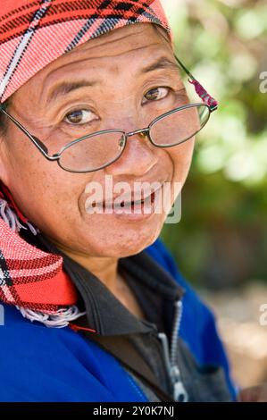 La minoranza Akha/Hani vive nel sud della Cina, nel Laos, nel Myanmar e nel nord della Thailandia. Foto Stock