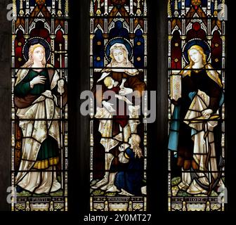 Vetrata Faith, Charity and Hope, St. Peter and St. Paul Church, Market Overton, Rutland, Inghilterra, Regno Unito Foto Stock