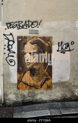 Street art su una parete del centro storico di Firenze, Toscana, Italia Foto Stock