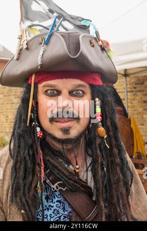 England, Kent, Faversham, The Annual Pirate Festival, Portrait of male Participant Dresssed in Pirate Costume Foto Stock