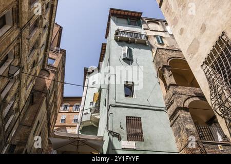 Siena è stata una delle città più importanti dell'Europa medievale e il suo centro storico è un sito patrimonio dell'umanità dell'UNESCO. Piazza del campo nel Palio Foto Stock