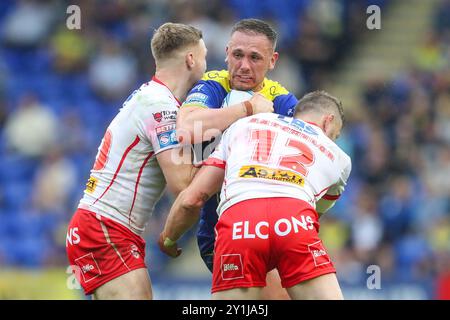 Ben Currie dei Warrington Wolves viene affrontato durante la partita del Betfred Super League Round 25 Warrington Wolves vs St Helens all'Halliwell Jones Stadium, Warrington, Regno Unito, 7 settembre 2024 (foto di Gareth Evans/News Images) Foto Stock