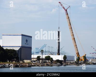 Il primo stadio utilizzato nel lancio dell'NROL-113 il 5 settembre è atterrato con successo sulla nave drone "of Course i Still Love You" di stanza nell'Oceano Pacifico. Dopo l'atterraggio, il booster è stato trasportato al porto di Long Beach per il recupero e la ristrutturazione. S 7 settembre 2024 Long Beach, CA, USA. Foto di Paul Harris/ABACAPRESS. COM credito: Abaca Press/Alamy Live News Foto Stock