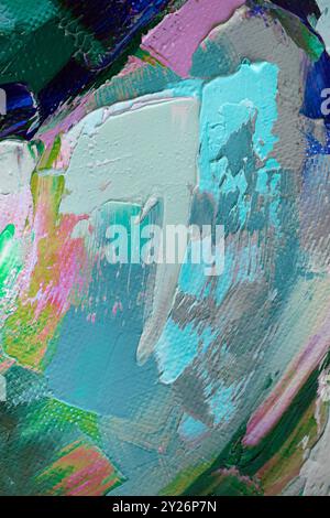Vivace texture astratta creata con colori audaci e tratti di pennello espressivi catturati durante una sessione d'arte Foto Stock