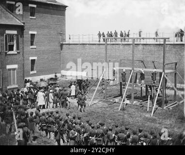 Esecuzione delle quattro persone condannate come cospiratori per l'omicidio di Lincoln (Mary E. Surratt, Lewis T. Powell, David E. Herold e George A. Atzerodt) Foto Stock