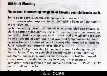 Avviso di epilessia sulle istruzioni del videogioco - si prega di leggere prima di utilizzare questo gioco o consentire ai vostri figli di usarlo Foto Stock