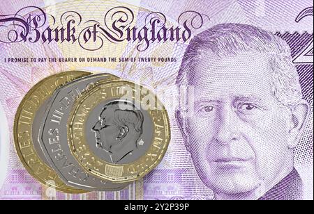 Charles III curency britannico - banconota da 20 sterline, moneta da 2 sterline e moneta da 1 sterline Foto Stock