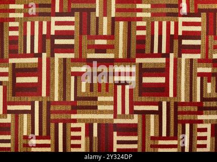 Motivo casuale della trapuntatura della recinzione a rotaia in rosso, beige e marrone. Tessuto senza cuciture per tappezzeria e rivestimento. Niente persone. Foto Stock