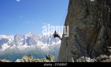 Mountain Climber Scaling Peaks a Chamonix, Francia Foto Stock