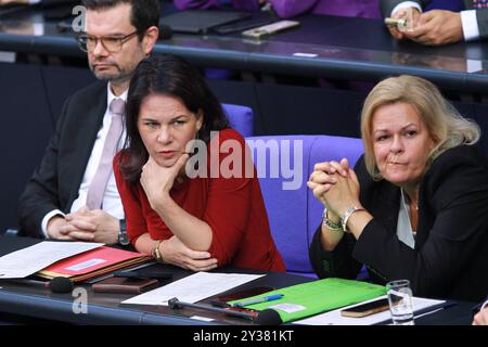 Berlin, Deutschland, 12.09.2024: Deutscher Bundestag: 185. Bundestagssitzung - Haushaltswoche: Bundesminister der Justiz Marco Buschmann FDP, Bundesministerin des Auswärtigen Annalena Baerbock Bündnis90/die Grünen und Bundesministerin des Innern und für Heimat Nancy Faeser SPD *** Berlino, Germania, 12 09 2024 Bundestag 185 Bundestag sessione Bündnis90 Grünen 460 Foto Stock