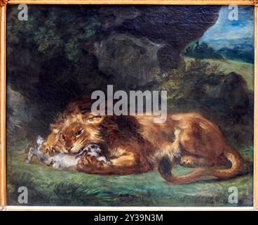 Lion devouring a Rabbit, circa 1855, Oil on Canvas, Eugène DELACROIX, Saint-Maurice (près de Paris), 1798 - Parigi, 1863, Musée du Louvre, Parigi, franco Foto Stock