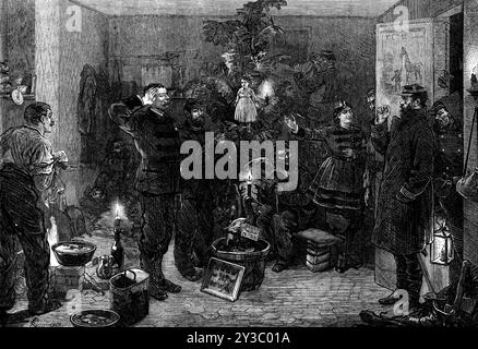 Vigilia di Natale agli avamposti, Parigi, 1871. "...F&#xe9;lix Regamey's Characteristic Illustration of Reveillon - [scena durante l'assedio di Parigi, con estratti dal suo diario:]..."l'esercito è andato nei quartieri invernali; ...calore e gaiety ritornano, e saremo in grado di avere un Reveillon fino alla notte. I nuovi arrivati da Parigi, che ci danno i dettagli e il risultato dell'ultima battaglia (di cui avevamo visto solo un angolo - il nostro), sono in possesso di bottiglie e viand subacquei che sono disposti a sacrificare sull'altare della patrie. Questo contributo costituisce la base della festa, e ev Foto Stock