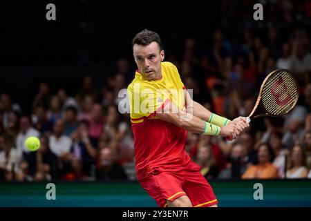 Valencia, Spagna. 13 settembre 2024. VALENCIA, SPAGNA - 13 SETTEMBRE: La Spagna Roberto Bautista Agut torna a giocare contro la Francia Arthur Fils durante la fase a gironi 2024 della Coppa Davis, partita di Valencia tra Francia e Spagna a Pabellon Fuente De San Luis il 13 settembre 2024 a Valencia, Spagna. (Foto di Francisco Macia/Photo Players Images/Magara Press) crediti: Magara Press SL/Alamy Live News Foto Stock