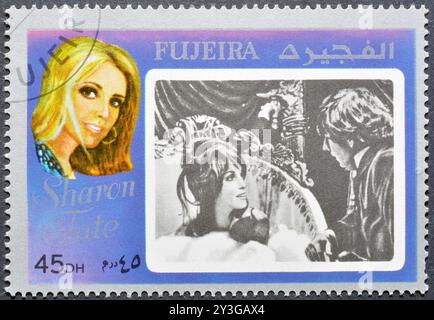 Francobollo cancellato stampato da Fujairah (Fujeira), che mostra la star del cinema - Sharon Tate, circa 1972. Foto Stock