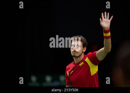 La Spagna Pablo Carreno busta in azione contro la squadra australiana Jordan Thompson durante la finale di Coppa Davis del gruppo B del 15 settembre, Foto Stock