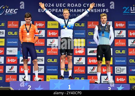 L-R, secondo olandese Olav Kooij, campione europeo belga Tim Merlier e estone Madis Mihkels festeggiano sul podio della Elite Road Race maschile al Campionato europeo 2024, a Hasselt, domenica 15 settembre 2024. I Campionati europei di ciclismo su strada 2024 si svolgeranno dall'11 al 15 settembre a Limburgo, in Belgio. BELGA FOTO DIRK WAEM Foto Stock