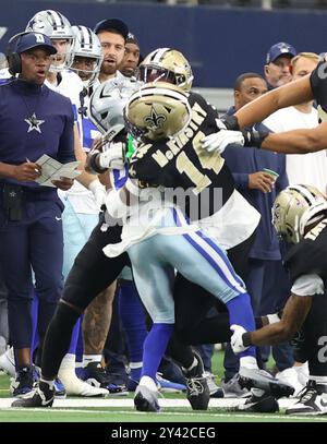 Irving, Stati Uniti. 15 settembre 2024. Il cornerback dei New Orleans Saints Kool-Aid McKinstry (14) affronta il wide receiver dei Dallas Cowboys KaVontae Turpin (9) durante una gara della National Football League all'AT&T Stadium domenica 15 settembre 2024 a Irving, Texas. (Foto di Peter G. Forest/Sipa USA) credito: SIPA USA/Alamy Live News Foto Stock