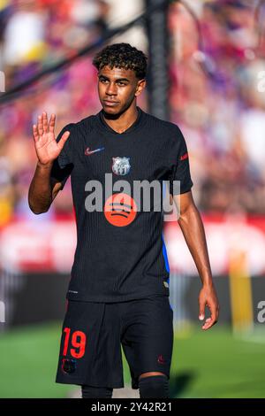 Girona, Spagna. 15 settembre 2024. Il Lamine Yamal del Barcellona reagisce durante la partita di calcio della Liga tra il Girona FC e il Barcellona a Girona, in Spagna, il 15 settembre 2024. Crediti: Joan Gosa/Xinhua/Alamy Live News Foto Stock