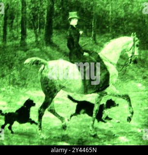 Qualsiasi immagine iniziale di una donna aristocratica che cavalca in sella con i suoi cani Foto Stock