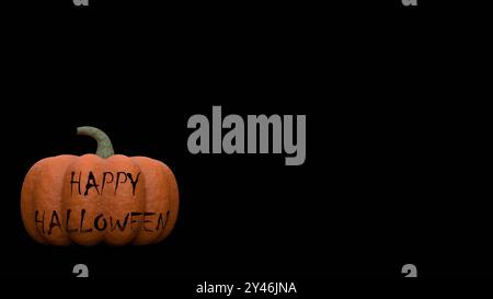 Zucca di Halloween con testo Happy Halloween su sfondo nero spazio per testo. Foto Stock