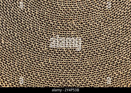 Vista ravvicinata del vecchio cartone ondulato da utilizzare come palo per graffiare il gatto, sfondo, orizzontale, vista dall'alto. Foto Stock