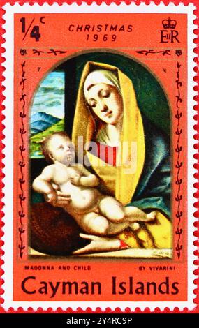 Foto di un ¼ francobollo in cent giamaicano delle Isole Cayman con dipinto la Vergine col bambino circa 1483 di Alvise Vivarini Natale 1969 Foto Stock