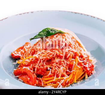 spaghetti in salsa di pomodoro e parmigiano Foto Stock