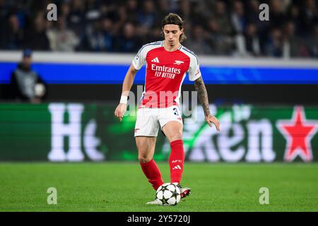 Bergamo, Italia. 19 settembre 2024. Riccardo Calafiori dell'Arsenal FC in azione durante la fase di UEFA Champions League 2024/25 partita di calcio tra Atalanta BC e Arsenal FC. Crediti: Nicolò campo/Alamy Live News Foto Stock