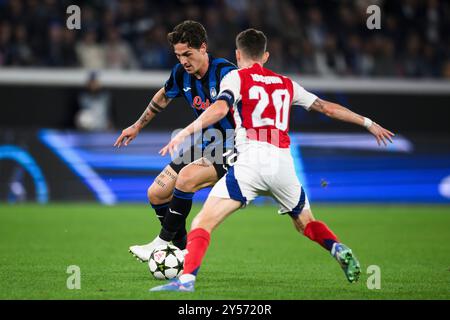 Bergamo, Italia. 19 settembre 2024. Nicol Zaniolo dell'Atalanta BC è sfidato da Jorginho dell'Arsenal FC durante la fase di UEFA Champions League 2024/25 partita di calcio tra l'Atalanta BC e l'Arsenal FC. Crediti: Nicolò campo/Alamy Live News Foto Stock