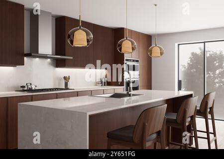 La cucina moderna ha un design elegante combinato con un'illuminazione elegante e moderna Foto Stock